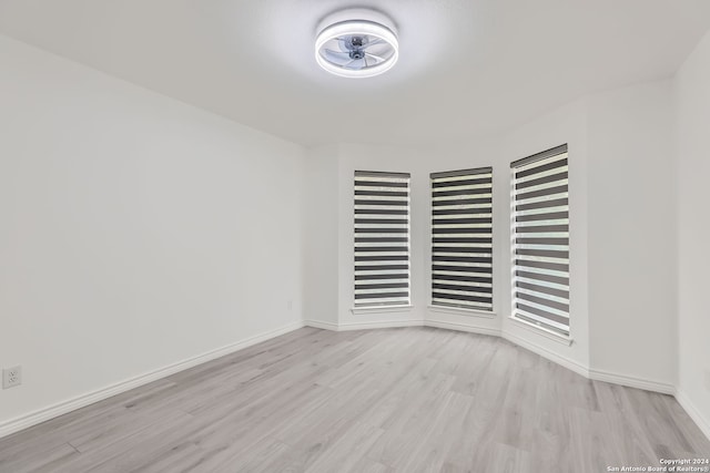 unfurnished room featuring light wood-type flooring