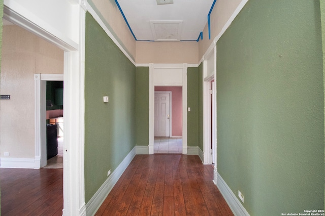 corridor featuring hardwood / wood-style floors