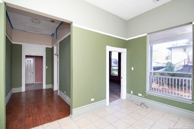 spare room featuring light hardwood / wood-style flooring