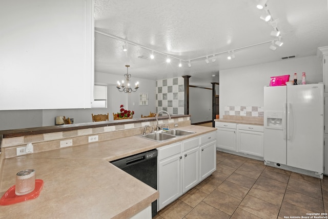 kitchen featuring white cabinets, white fridge with ice dispenser, dishwasher, pendant lighting, and sink