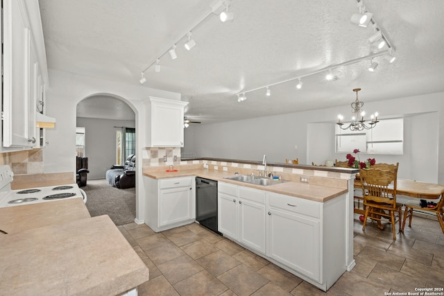 kitchen featuring black dishwasher, tasteful backsplash, kitchen peninsula, hanging light fixtures, and white cabinets