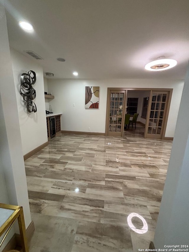 below grade area with visible vents, recessed lighting, and baseboards