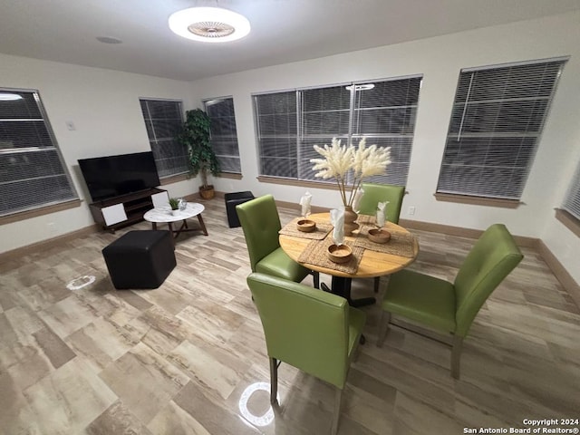 dining area featuring hardwood / wood-style floors