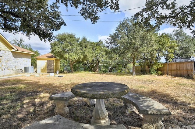 view of yard featuring central AC