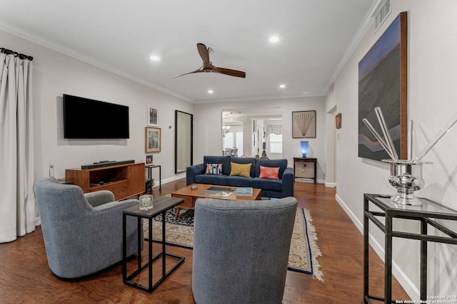 living room featuring dark wood-type flooring, crown molding, and ceiling fan