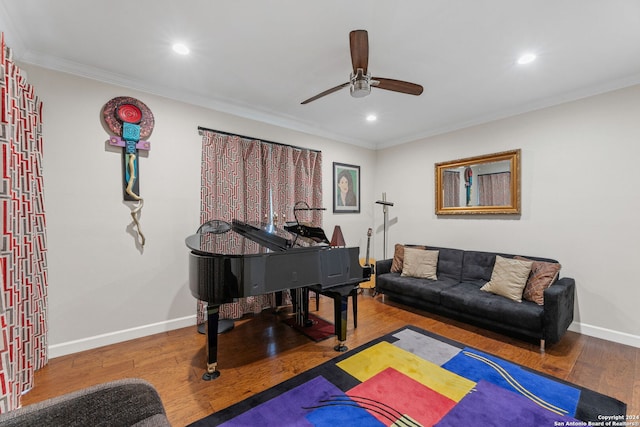 sitting room featuring crown molding, hardwood / wood-style flooring, and ceiling fan