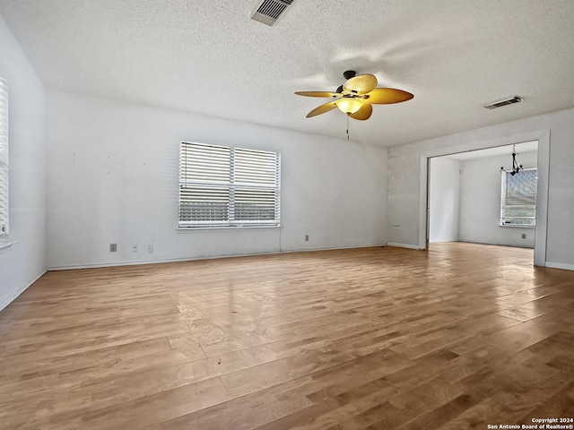 7114 Teton Rdg, San Antonio, TX 78233 - spare room with visible vents, a textured ceiling, and light wood-style flooring