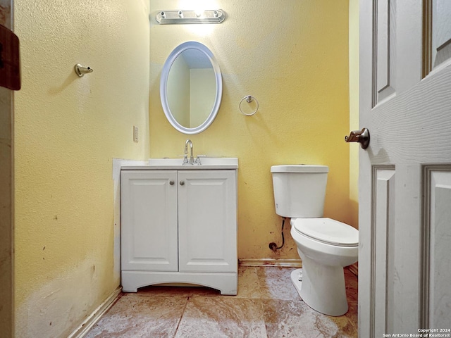 7114 Teton Rdg, San Antonio, TX 78233 - half bath featuring vanity, toilet, and baseboards