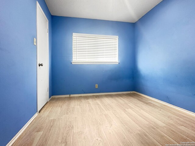 7114 Teton Rdg, San Antonio, TX 78233 - unfurnished room featuring wood finished floors and baseboards