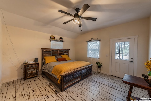 bedroom featuring ceiling fan and vaulted ceiling