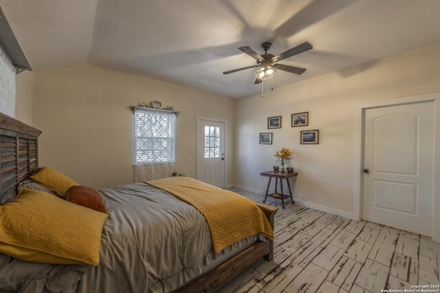 1627 Forest Lake Dr, Spring Branch, TX 78070 - bedroom with a fireplace, baseboards, and ceiling fan