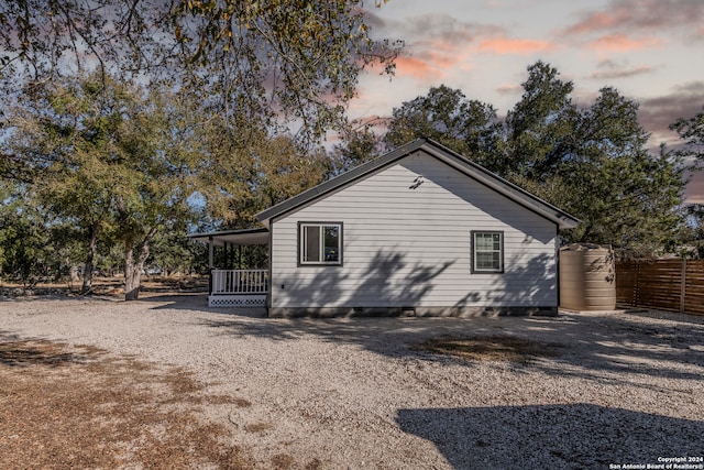 view of property exterior at dusk