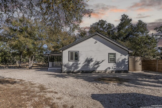 1627 Forest Lake Dr, Spring Branch, TX 78070 - back of property featuring a porch, crawl space, and fence