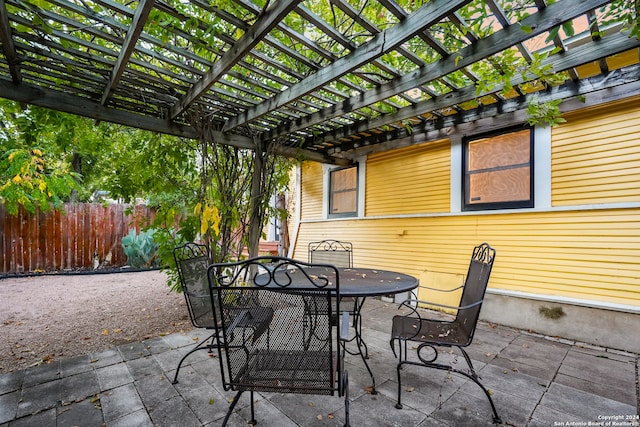 view of patio featuring a pergola