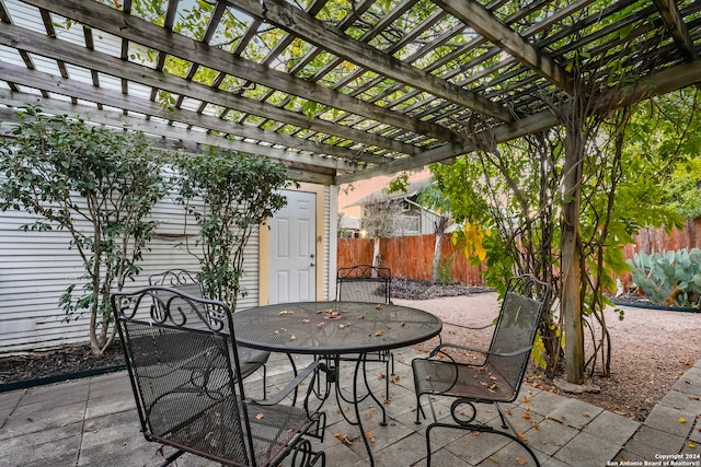 view of patio featuring a pergola