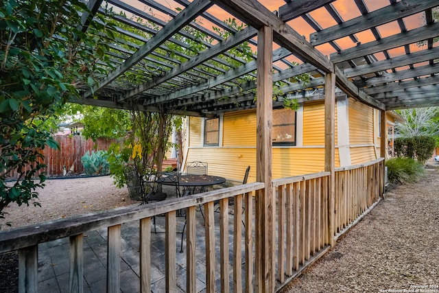 view of home's exterior featuring a pergola