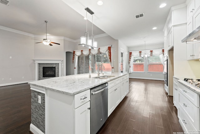 kitchen with sink, dark wood-type flooring, white cabinetry, and stainless steel appliances