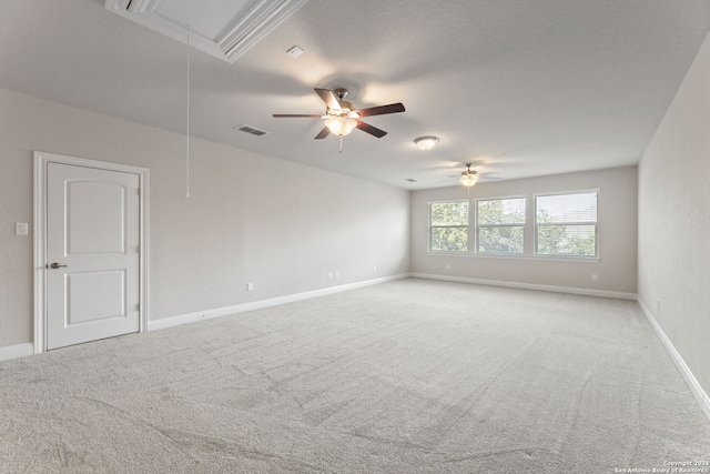 unfurnished room featuring light colored carpet and ceiling fan