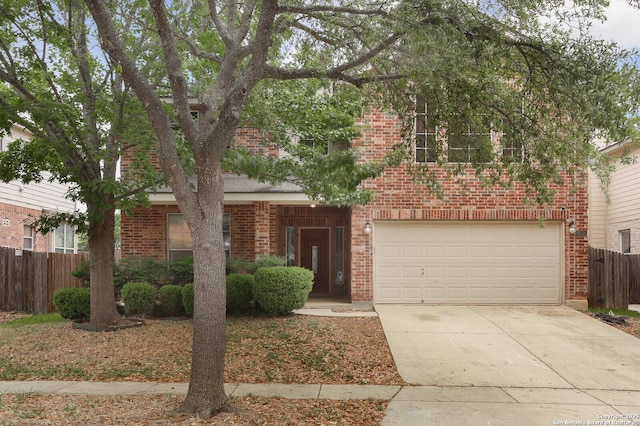 14514 Redwood Vly, Helotes, TX 78023 - view of front facade featuring brick siding, fence, concrete driveway, and an attached garage