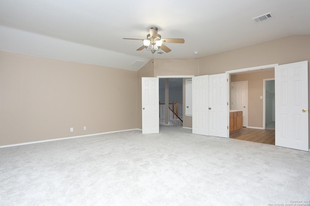 14514 Redwood Vly, Helotes, TX 78023 - unfurnished bedroom featuring carpet flooring, vaulted ceiling, baseboards, and a ceiling fan