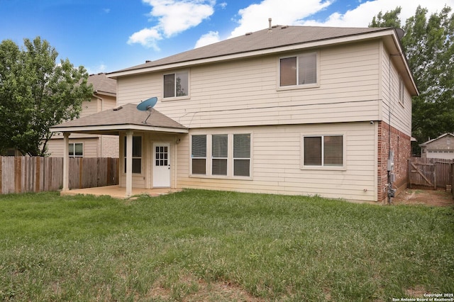 14514 Redwood Vly, Helotes, TX 78023 - back of house with a patio area and roof with shingles