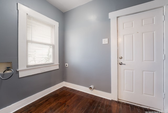 laundry room with hookup for an electric dryer, hookup for a washing machine, and dark hardwood / wood-style flooring