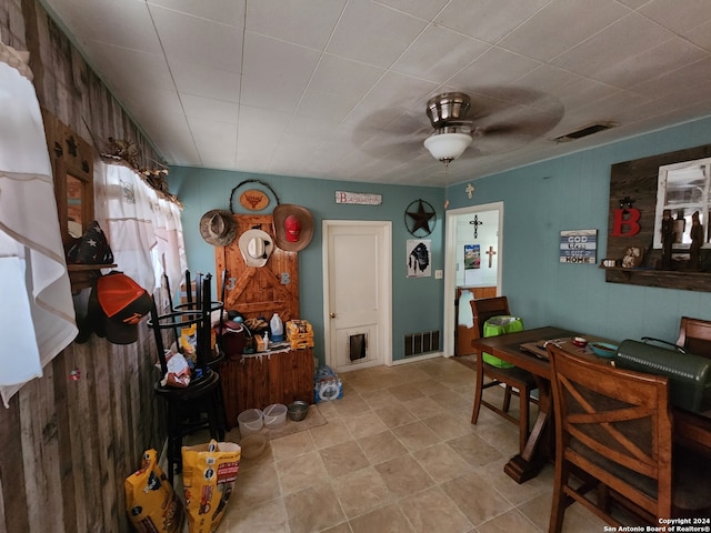 interior space featuring ceiling fan