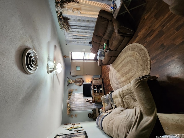 living room with wooden walls