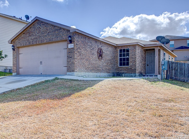 view of front facade with a front lawn and a garage