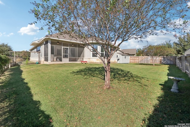 view of yard featuring a sunroom