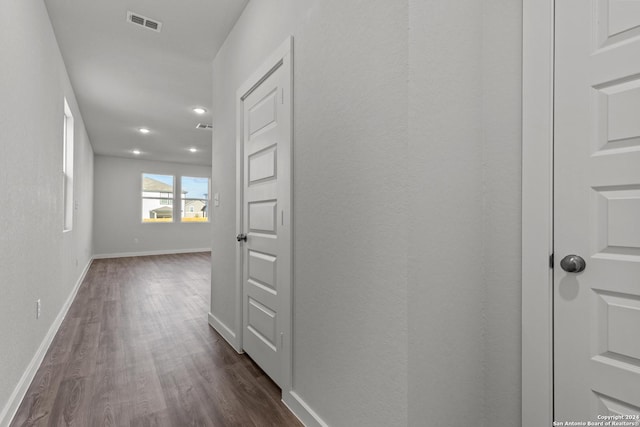 10719 Gilmore Gdn, San Antonio, TX 78109 - hall with dark wood-style flooring, visible vents, recessed lighting, and baseboards