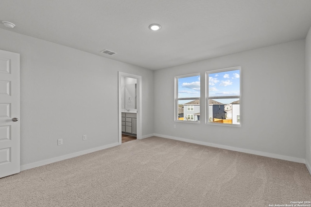 10719 Gilmore Gdn, San Antonio, TX 78109 - carpeted spare room with visible vents, recessed lighting, and baseboards