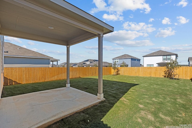 10719 Gilmore Gdn, San Antonio, TX 78109 - view of yard featuring a patio and a fenced backyard