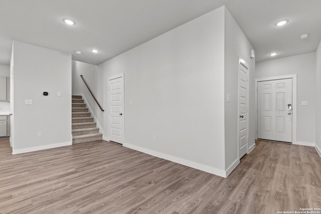 10719 Gilmore Gdn, San Antonio, TX 78109 - interior space with baseboards, recessed lighting, stairs, and light wood-style flooring