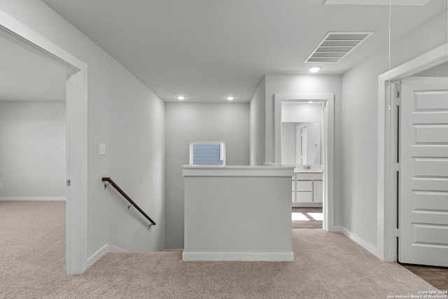 10719 Gilmore Gdn, San Antonio, TX 78109 - corridor with an upstairs landing, carpet flooring, baseboards, and visible vents