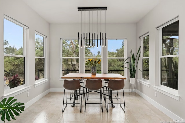 sunroom / solarium with a wealth of natural light