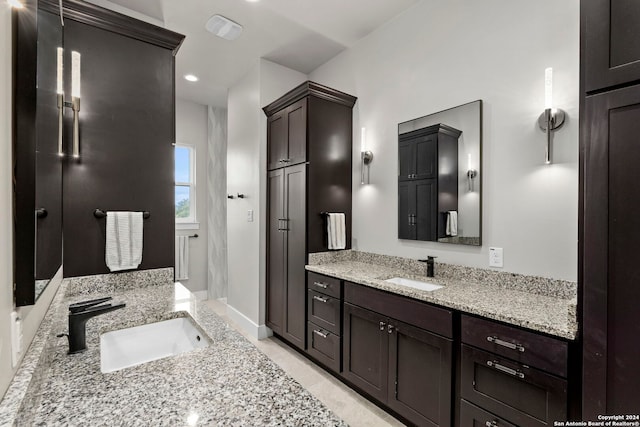 bathroom with vanity and tile patterned floors