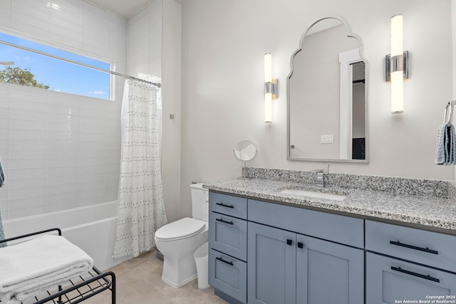 full bathroom with vanity, shower / bath combination with curtain, and toilet