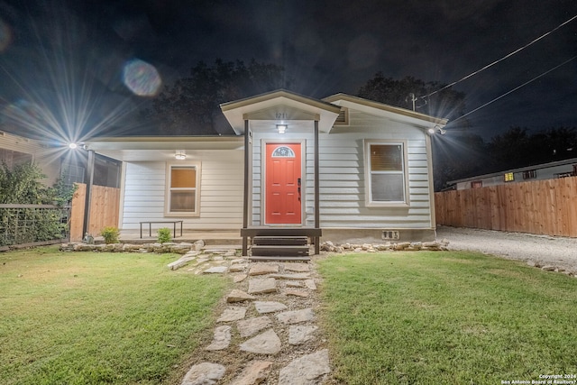 view of front of home with a front yard