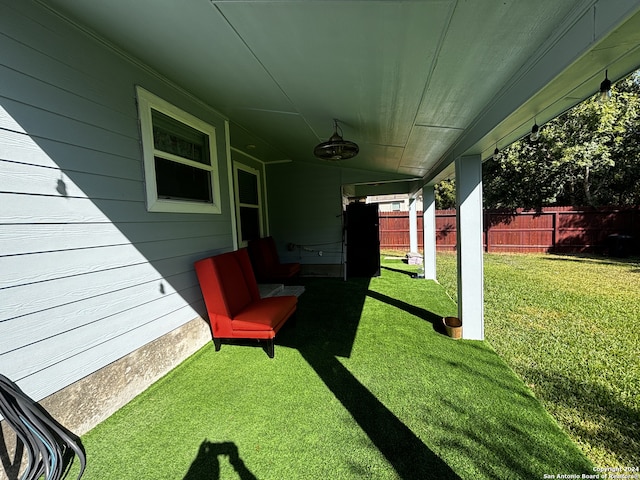 view of yard featuring ceiling fan