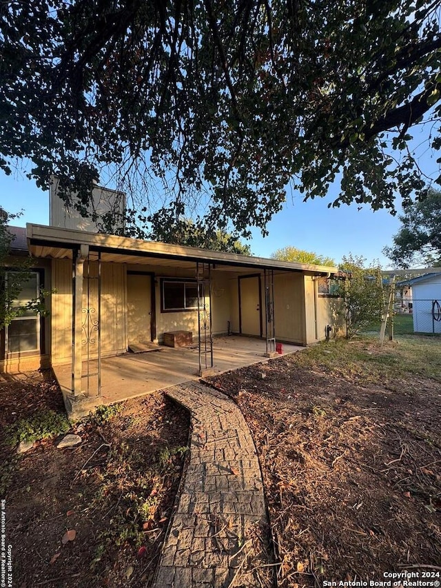 back of house featuring a patio area