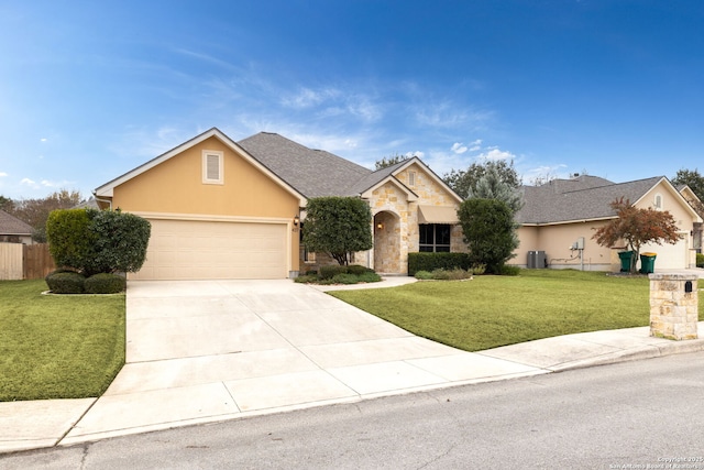 view of front facade with a garage and a front yard