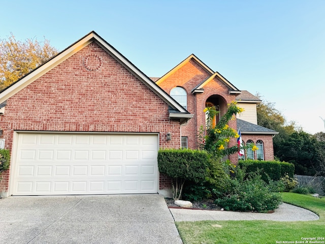 front of property with a garage