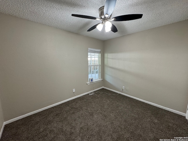 carpeted empty room featuring a textured ceiling and ceiling fan