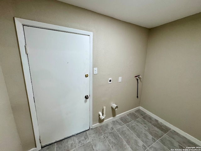 laundry room with hookup for an electric dryer and gas dryer hookup