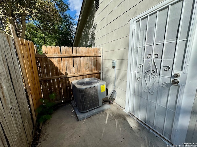 view of patio with central AC