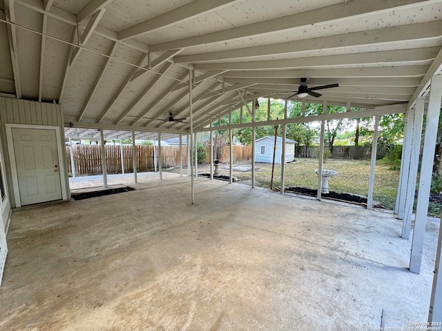 view of parking / parking lot featuring ceiling fan