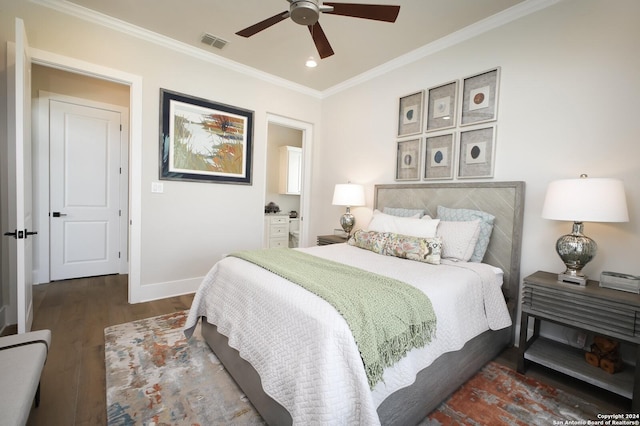 bedroom featuring dark hardwood / wood-style flooring, ornamental molding, and ceiling fan