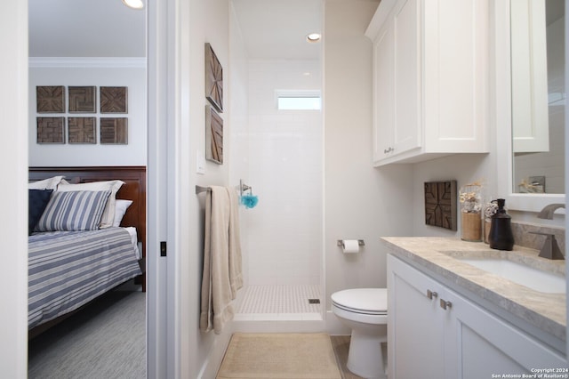 bathroom with vanity, crown molding, toilet, and walk in shower