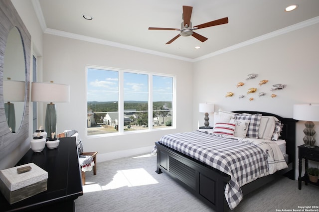 bedroom featuring light carpet, crown molding, and ceiling fan